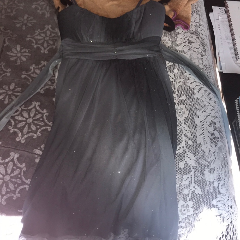 A sparkly grayish blue dress